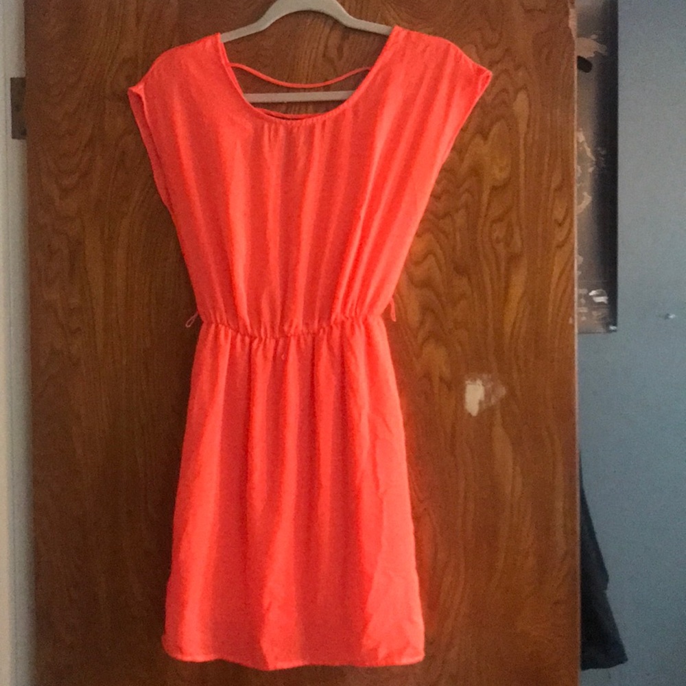 Very bright orange dress!